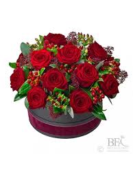 If you're looking for something extra special, you can always order a bespoke hat box flowers. Deluxe Dozen Red Roses In Presentation Hatbox