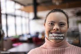 7.769 Downs Syndrome Portrait Stock Photos, High-Res Pictures, and Images