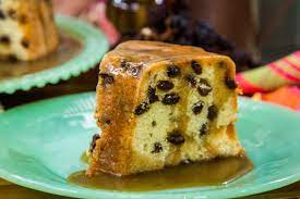 Light & fluffy topped with chopped pecans and soaked in a reduced sugared rum glaze. Rum Raisin Pound Cake With Buttered Rum Sauce Rum And Raisin Cake Raisin Cake Rum Raisin