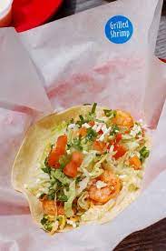 Season the cod with salt, pepper, and paprika. Grilled Shrimp Tacos Picture Of Fuzzy S Taco Shop Oklahoma City Tripadvisor