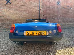 Image result for Tahiti Blue 1977 MG