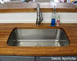 An undermount sink can especially improve the functionality and style of a wood counter top if installed correctly. My Butcher Block Countertops Two Years Later Domestic Imperfection