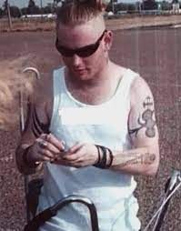 Corey taylor of stone sour showing his tattoo of his his name written in russian. He Looks So Young Corey Taylor Slipknot Corey Taylor Taylor