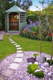 Adding the border of white rocks along with the pink. 50 Very Creative And Inspiring Garden Stone Pathway Ideas