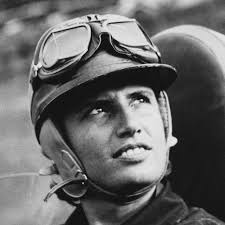 Alain Prost (#11) duels with his McLaren teammate and rival Ayrton Senna  (#12) heading into the first turn at Estoril. FIA...