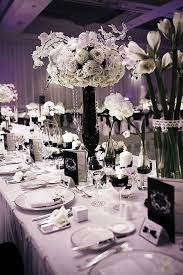 A Sophisticated Black And White Wedding The Wedding Notebook Magazine White Wedding Centerpieces Black And White Wedding Theme Wedding Centerpieces