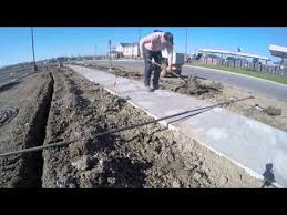 This process starts with pressure washing the surface to lift and remove. Drilling Underneath A Concrete Sidewalk To Install Some Lawn Sprinkler Lines Lawn Sprinklers Sidewalk Concrete