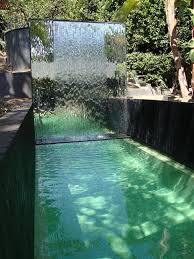 26 Splendid Takes On A Pool With Water Feature Pool Water Features Backyard Pool Swimming Pool Designs