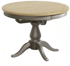 It draws a classic line, in a pleasant contrast with the modern design of the interlocking legs. Penelope Grey Painted W Oak Top Round Pedestal Extending Dining Table Progressive Furnishings