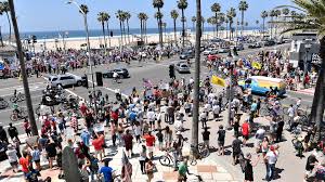 Huntington in a great place to surf, swim, sunbathe, fish or just watch the sun set. Thousands Of Protesters Flock To Huntington Beach Following State Ordered Oc Beach Closures Orange County Register