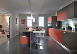 Model Arcos Van Schmidt In Een Uitgesproken Warme Kleurstelling Cuisine Americaine Cuisines Design Cuisine Ouverte Sur Salon