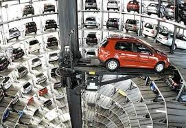 Autostadt Es Un Sistema Construido En Alemania Para Almacenar De Forma Compacta Y Robotizada Vehiculos Volkswagen Autostadt Wolfsburg Autos