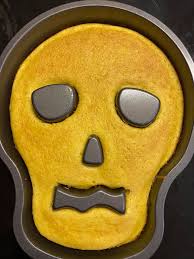 I made sugar cookies with royal icing and two with black smoked salt. I  found a skull cookie cutter, so I had to make it.