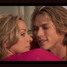 S/S 2003 FUCHSIA FEATHER ROBE BY JULIEN MACDONALD -Sex and the City: Season  6, Ep. 5 Smith: My play starts previews this week. Samantha: Play? Smith: I  was thinking you could come