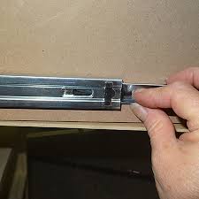 I have looked on the outside and underneath and do not see any latch. How To Remove Dresser Drawer With Bottom Center Metal Slide How To Remove A Drawer With Metal Slides