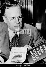 Aviator Amelia Earhart Putnam, her husband, George Walter Putnam, and his  son, David B. Putnam, center, dine at a hotel in Providence, R.I.,