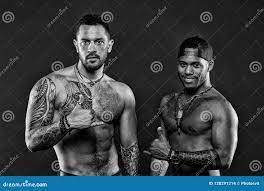 People Tattoo for Different Reasons. Brutal Macho Style. Muscular Men with  Fashionable Tattoo Style Stock Photo - Image of confidence, workout:  128291214