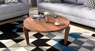 The best way to tie your room together is with a stylish coffee table. Meridian Coffee Table Urban Ladder
