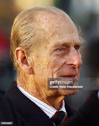 Queen Elizabeth II and Prince Philip lay a wreath at the Sandringham...  News Photo