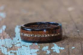 These can last a long time. Hawaiian Koa And Ebony Wood Ring With Your Sand Inlay