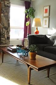 Jessica from domicile37 has this clear acrylic coffee table in her kid's play room. How To Style A Family Friendly Coffee Table