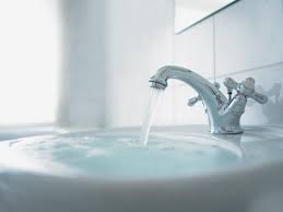 the purpose of a bathroom sink overflow