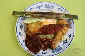This amazing dish served with 'sambal' and a variety of delicious side dishes. All About Ceil Pandan Leaf Nasi Lemak Cheap Good