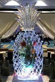 Single Ice Block Plus With A Pineapple And Floral Frozen Into A Pineapple Ice Sculpture For A Local Hs Prom Ice Sculptures Ice Carving Ice Sculpture Wedding