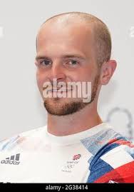 Great Britain Archery team member Patrick Huston, during the kitting out  session for the Tokyo Olympics 2020 at the Birmingham NEC, UK. Picture  date: Monday June 14, 2021 Stock Photo