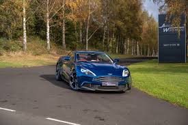 Image result for Concours Blue 2017 Aston Martin