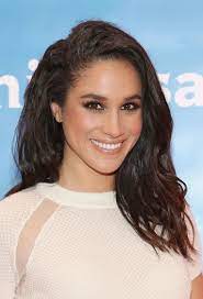 Photos of meghan markle with her naturally curly hair are going viral on social media. How Meghan Markle S Hair Has Changed Over The Years