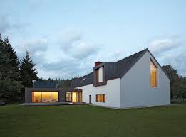 A Striking Bohemian Geothermal Home House Exterior Architecture House Exterior House Materials