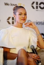 This is a great trick for short tresses. How Victoria S Sexy Model Candice Swanepoel Makes A Bun Hairstyle Look Smokin Hot Glamour