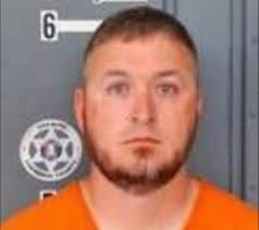 Terrence Michael Rager was booked into the Hancock County Justice Center