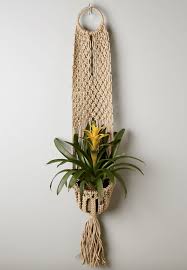 Wrap the yellow rope around the white ropes, creating a diy hanging cookie tin planters. The 12 Best Macrame Plant Hangers Of 2021