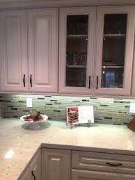 cute white kitchen cabinets with quartz