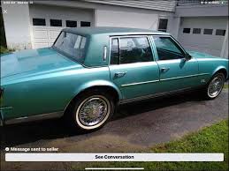 Image result for Dark Aqua 1979 Cadillac