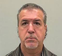 Prison guard accused of assaulting handcuffed inmate