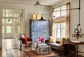 Add Storage With An Armoire Town Country Living Farm House Living Room Farmhouse Decor Living Room Shingle Style Homes