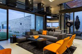 They would provide contrast against your orange sofa, and create a more animated mood for the room. Grey Sofa Orange Chairs Rug Coffee Table Luxurious Modern Residence In Pretoria South Africa Fresh Palace