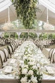 Long Mirror Top Table Floral Fixture Above Wicker Runner Modern Tented Re Garden Wedding Reception Garden Wedding Reception Decorations Romantic Garden Wedding