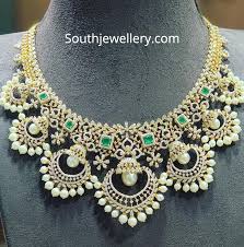 18 Carat Gold Diamond Emerald Necklace With Chandbali Motifs Studded With Diamonds And Emeralds By P Bridal Diamond Jewellery Big Necklace Long Pearl Necklaces