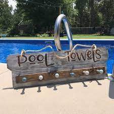 The traditional decorative design of this piece offers attractive, hotel style storage in smaller spaces. Custom Pool Sign Pool Towel Holder Pool Sign Pool Towel Etsy