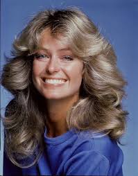 Så jeg vil ha en 'Farrah Fawcett Flip'-frisyre (bilde nedenfor), men jeg må  klippe håret først... Hvordan skal jeg be om å få håret klippet på  salongen? Altså, hva slags klipp trenger