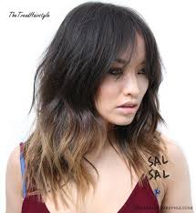 Ombré gives your hair a lot of contrast from root to tip and can differ as much as seven shades. Dark Ombre With Caramel Shades 40 Vivid Ideas For Black Ombre Hair The Trending Hairstyle