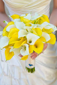 Ranunculus symbolizes 'radiant charm', in other words it means 'you are very attractive'. 10 Cala Lily Wedding Bouquets Arabia Weddings