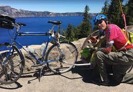 These include bonus free miles, merchandise for sale, and more. Man Rides Bike With Dog Across Country