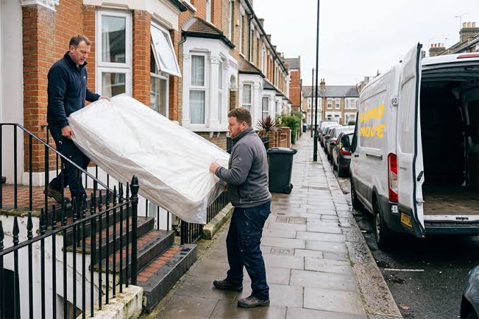 TFP team removing an approved old mattress from a Mauritian bedroom