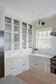 Glass, metal, and wood come together for a fascinating piece that never ceases to impress. Built In Glass Front Kitchen Hutch Transitional Kitchen