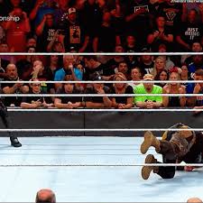 When he is holding the steel chair; Seth Rollins Curb Stomp Gif Sethrollins Curbstomp Braunstrowman Discover Share Gifs Seth Rollins Braun Strowman Seth